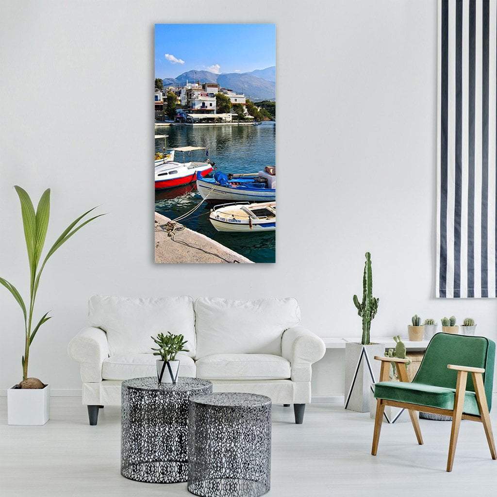 Greek Fishing Port Village Vertical Canvas Wall Art in white and blue, single vertical panel hung on a wall