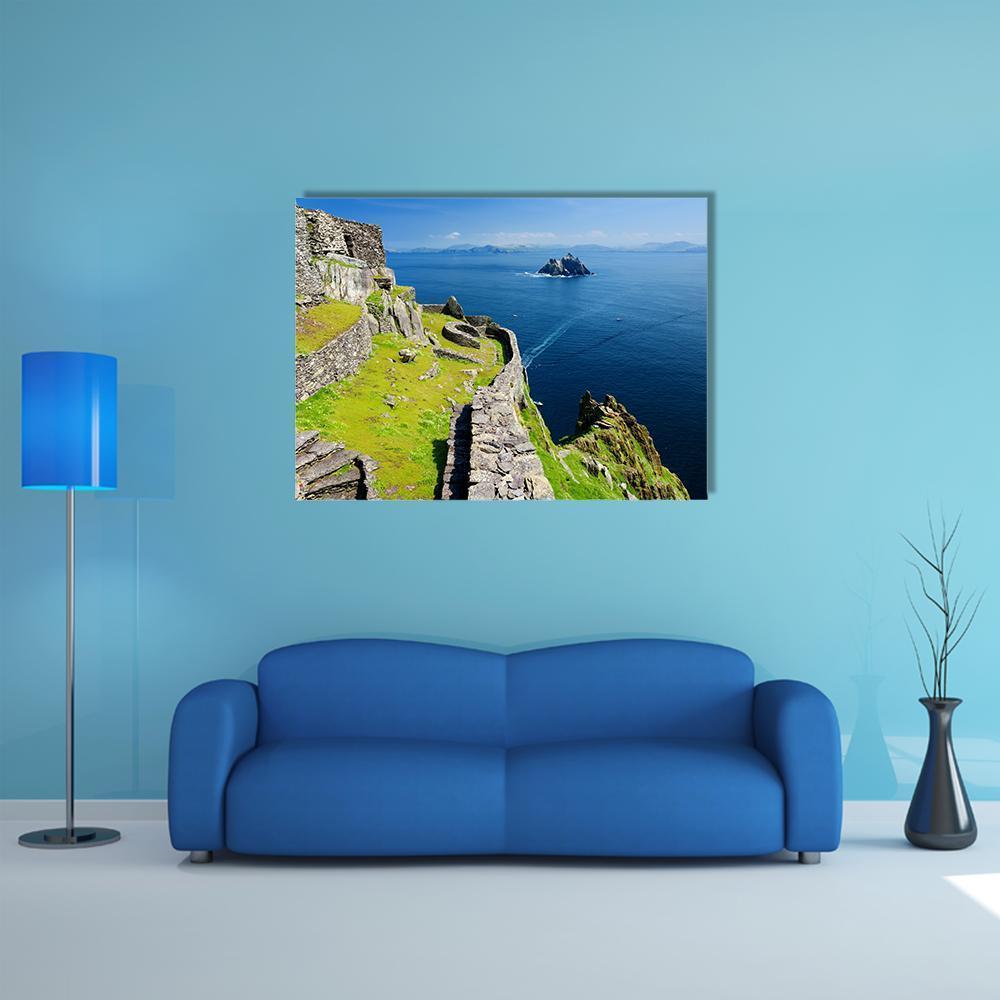 Skellig Michael Monastery Ruins Canvas Wall Art in gray, green and blue, single panel hung on a wall
