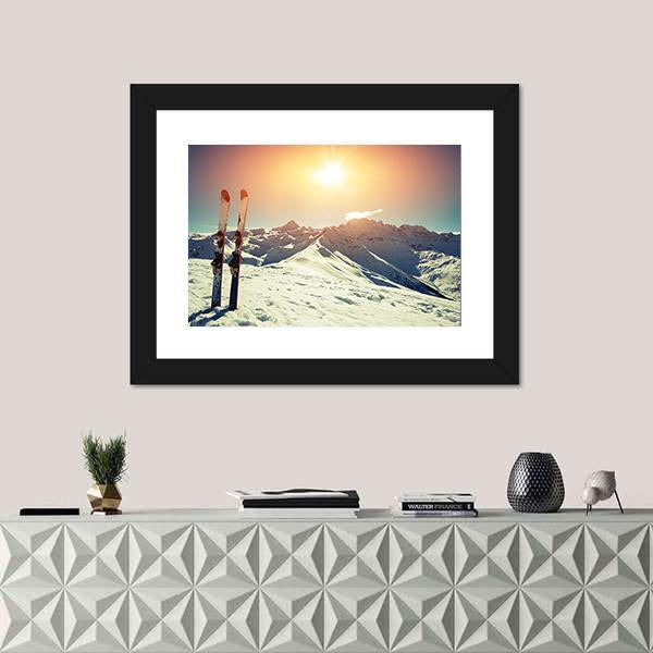 Skis in Snow at Mountains Canvas Wall Art in white, orange and blue, 4 panel Pop layout hung on a wall