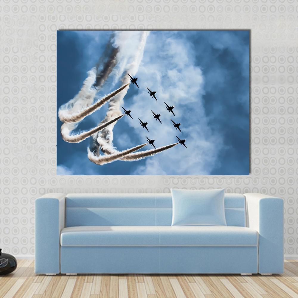 Sky Fighters Airshow Canvas Wall Art in white, gray and blue, hung on a wall