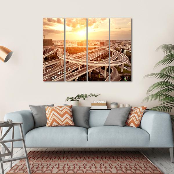 Skyline And Traffic Trails On Highway Intersection Canvas Wall Art-4 Horizontal-Gallery Wrap-34" x 24"-Tiaracle