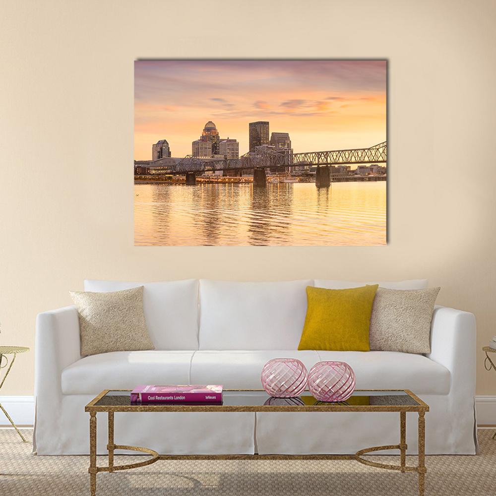 Downtown Louisville Skyline at Sunset Canvas Wall Art in gray, orange and yellow, single panel hung on a wall