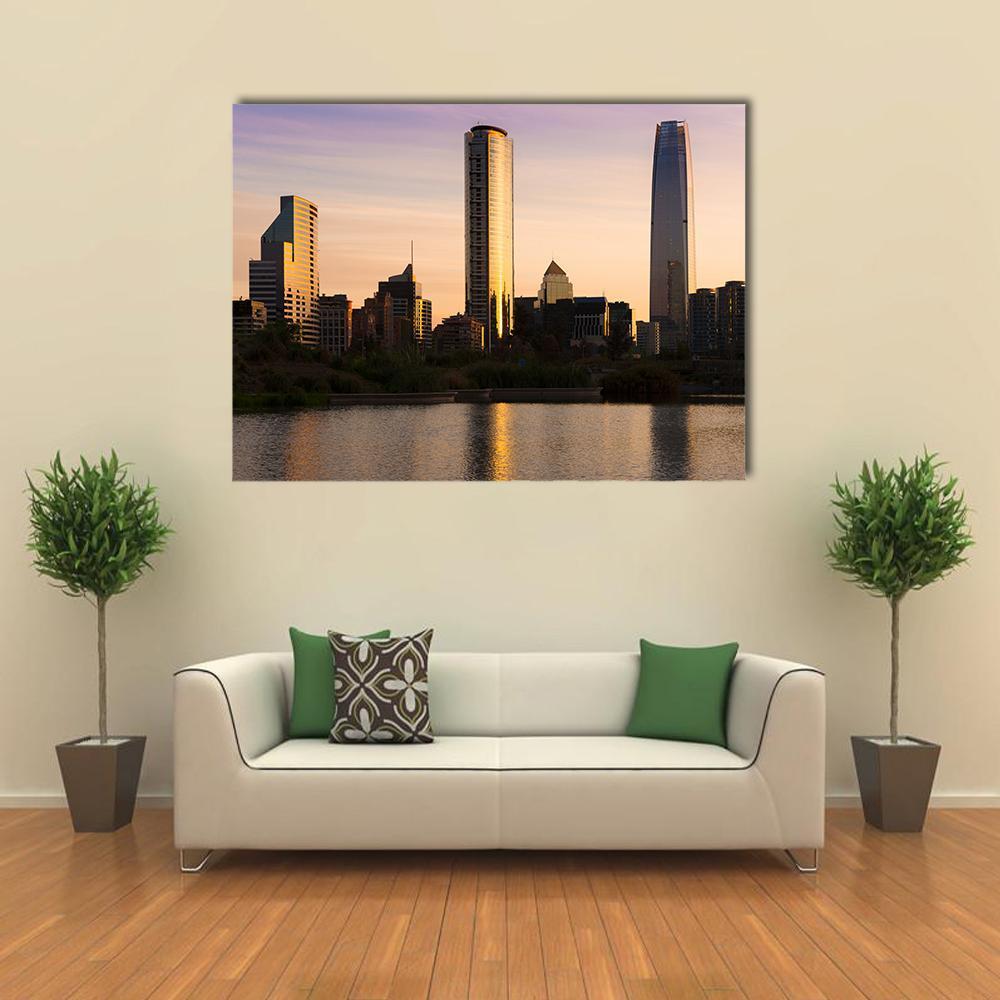 Las Condes Skyline at Sunset Canvas Wall Art in orange, yellow and purple, single panel hung on a wall