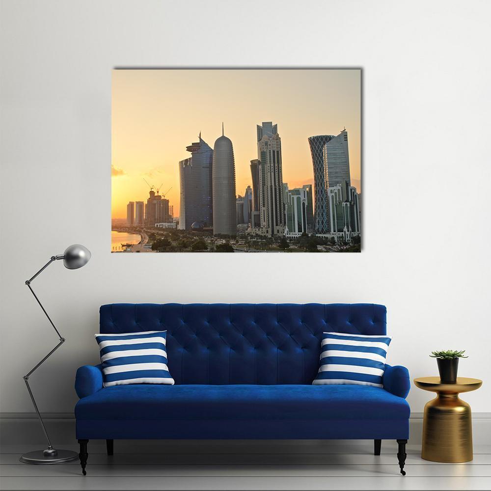 Doha Commercial Center Skyline at Sunset Canvas Wall Art in gray, orange and yellow, single panel hung on a wall