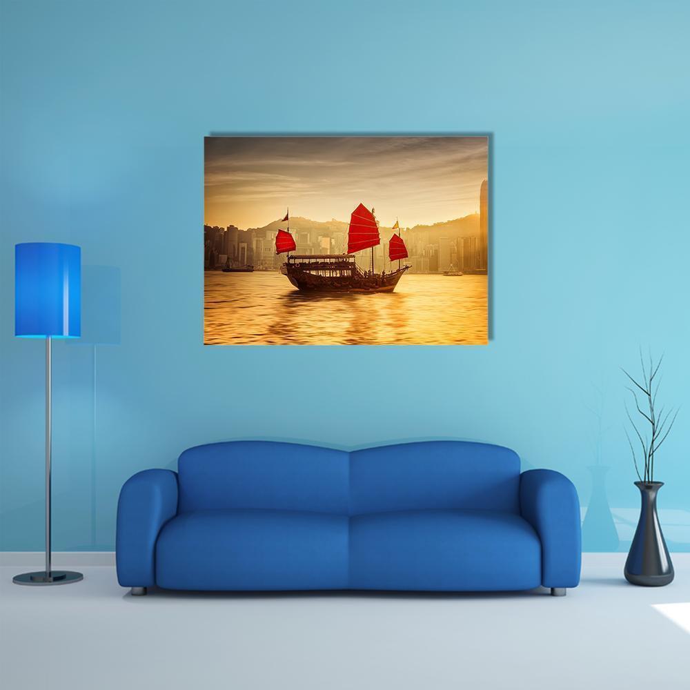 Hong Kong Skyline with Red-sailed Junk Boat Canvas Wall Art in gold, red and yellow, single panel hung on a wall