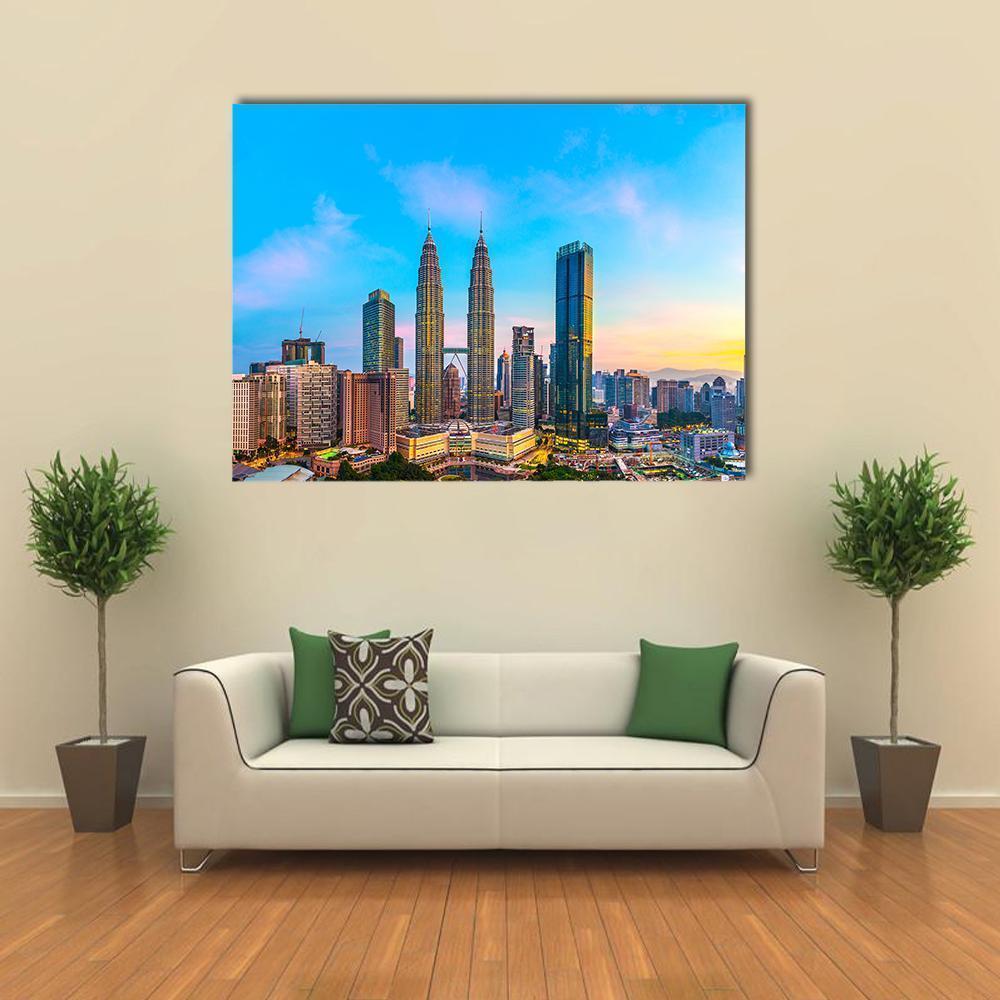 Kuala Lumpur Skyline at Dusk Canvas Wall Art in orange, yellow and blue, single panel hung on a wall