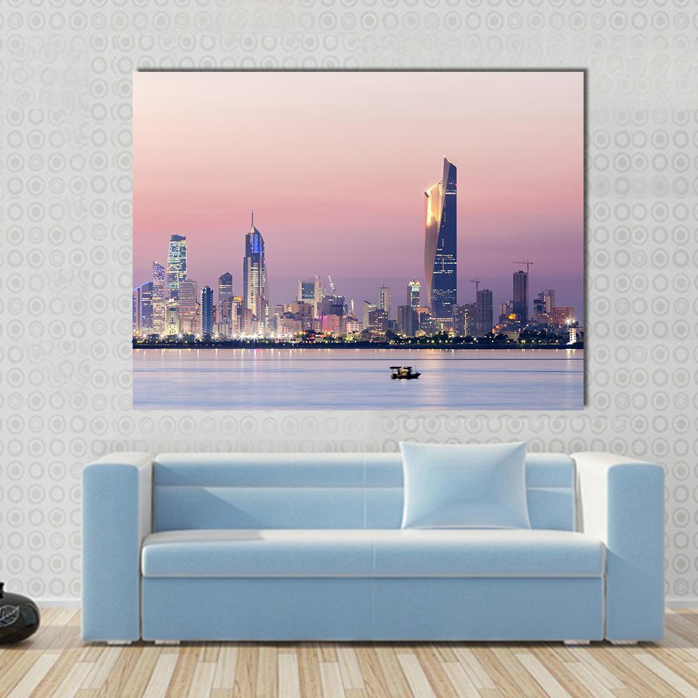 Skyline of Kuwait City at Night Canvas Wall Art in blue, purple and pink, single panel hung on a wall