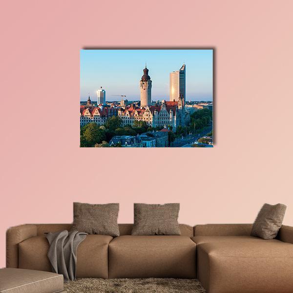 Leipzig Skyline with Town Hall at Sunset Canvas Wall Art in brown, orange and blue, single panel hung on a wall