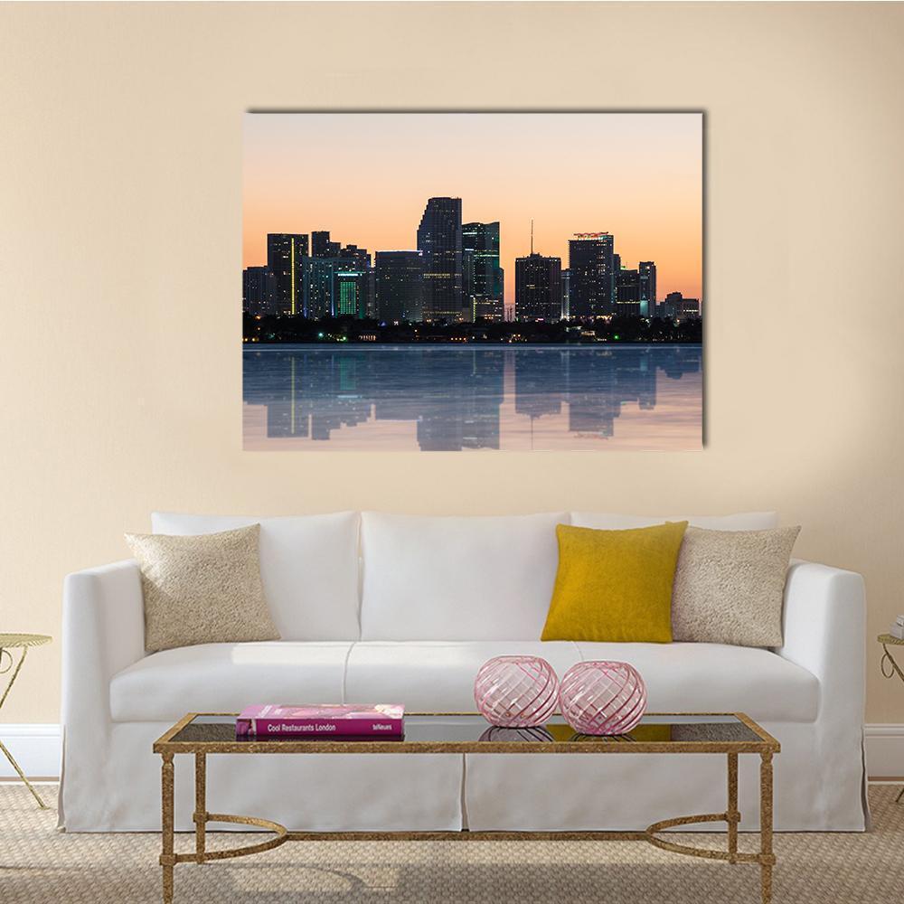 Miami Beach Skyline at Sunset Canvas Wall Art in gray, orange and blue, single panel hung on a wall