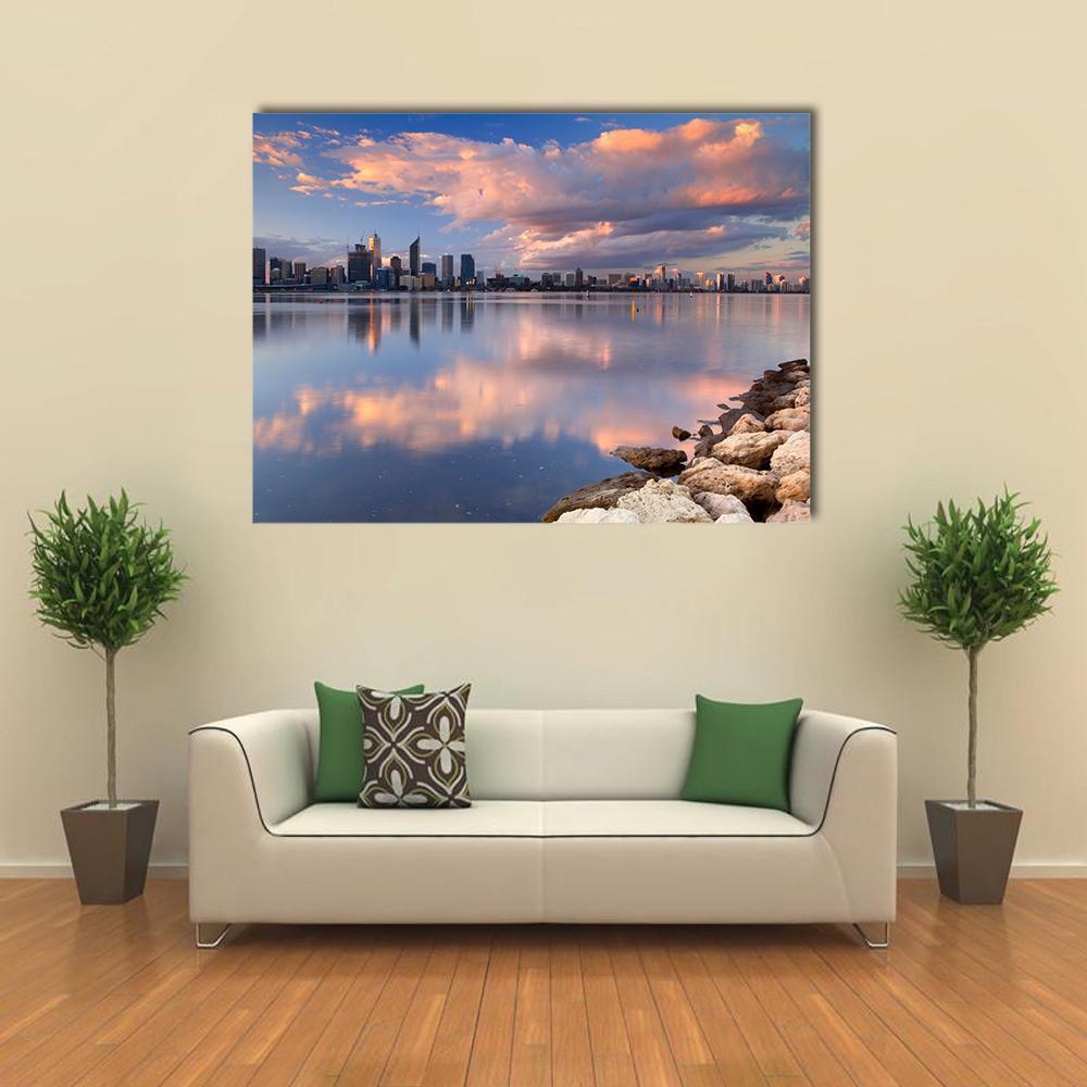 Perth Skyline Over Swan River Canvas Wall Art in orange, blue and pink, single panel hung on a wall