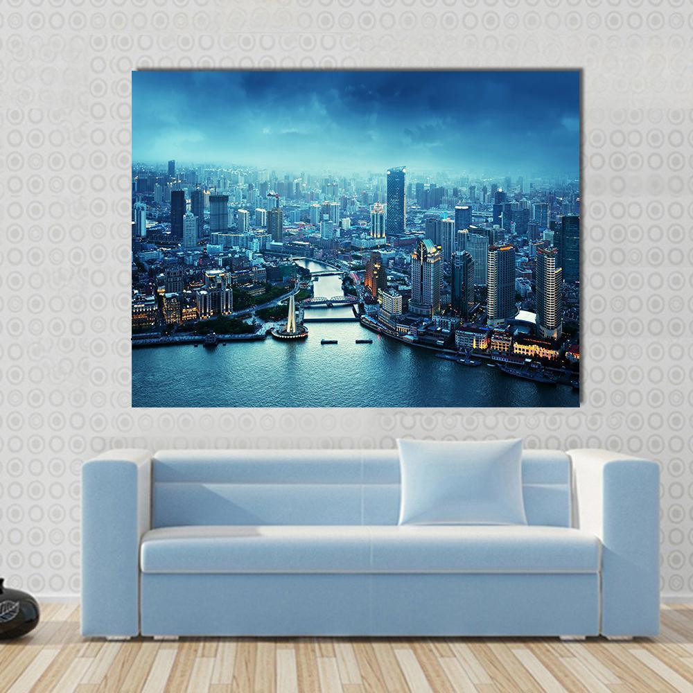 Skyline of Shanghai at Sunset Canvas Wall Art in blue and navy, single panel hung on a wall
