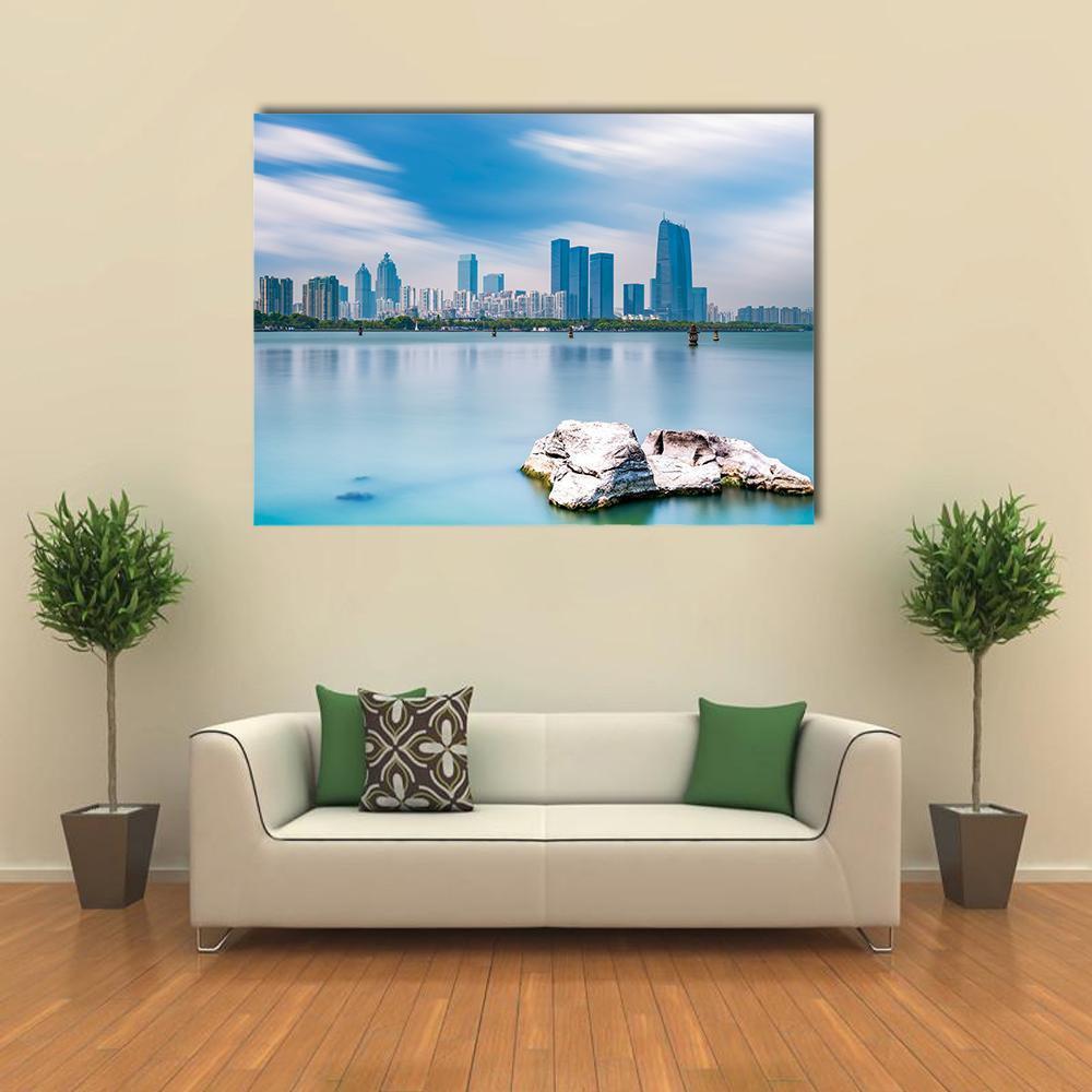 Suzhou Jinji Lake Skyline Canvas Wall Art in white and blue, single panel hung on a wall