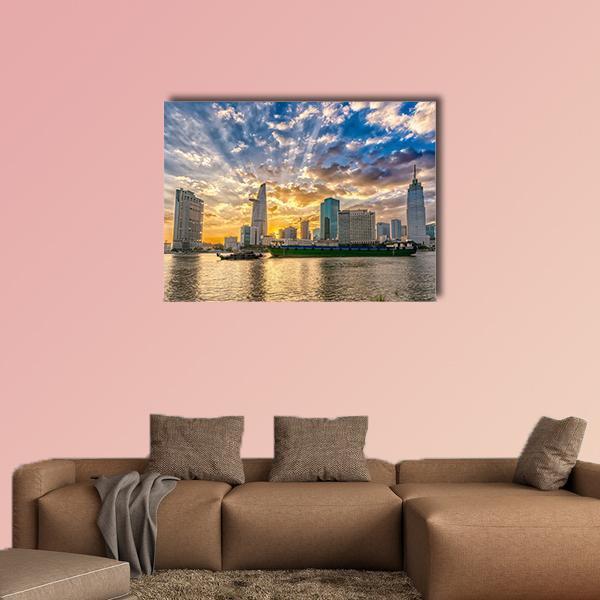 Ho Chi Minh City River Sunset Skyline Canvas Wall Art in orange, yellow and blue, single panel hung on a wall