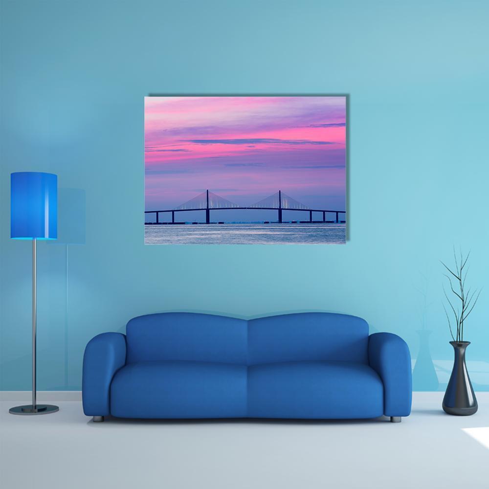 Skyway Cable-stayed Bridge at Dusk Canvas Wall Art in blue, purple and pink, single panel hung on a wall