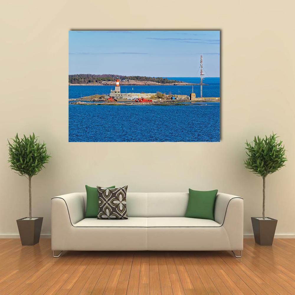 Harmaja Island Lighthouse and Sea Canvas Wall Art in gray and blue, single panel hung on a wall
