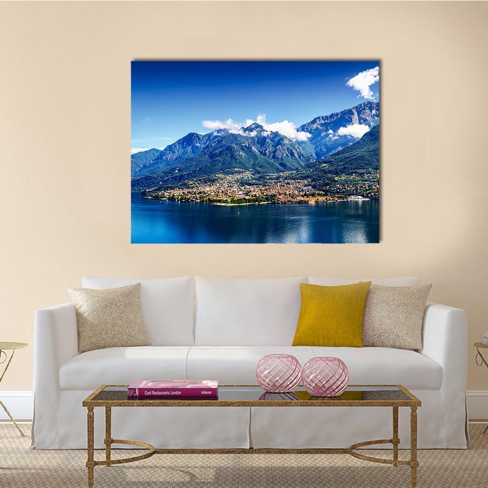 Small Town at Foot of Alpine Mountain, Lake Como Canvas Wall Art in green and blue, single panel hung on a wall