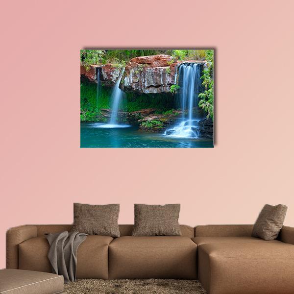 Fern Pool Waterfall Canvas Wall Art in brown, green and blue, single panel hung on a wall