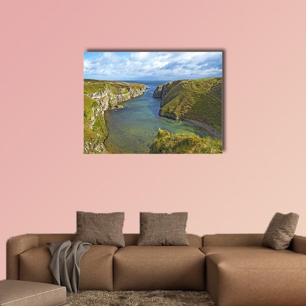 Smoo Cave Bay Landscape Canvas Wall Art in gray, green and blue, single panel hung on a wall