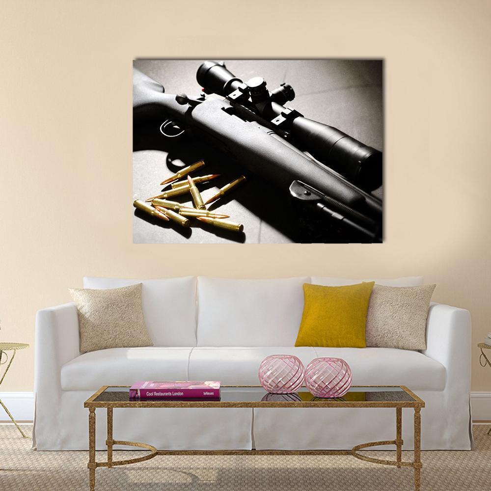 Sniper Rifle with Brass Bullets Canvas Wall Art in black, gray and gold, single panel hung on a wall