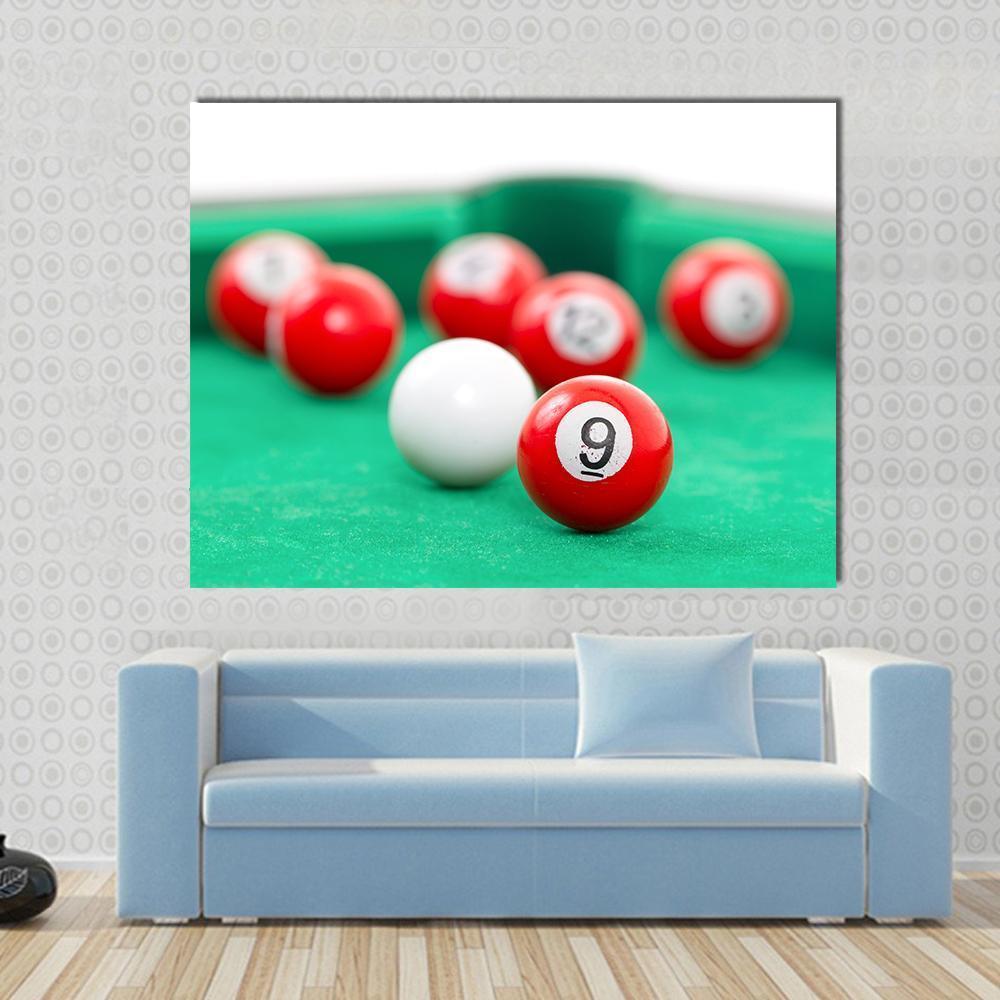 Snooker Balls on a Green Table Canvas Wall Art in white, red and green, single panel hung on a wall