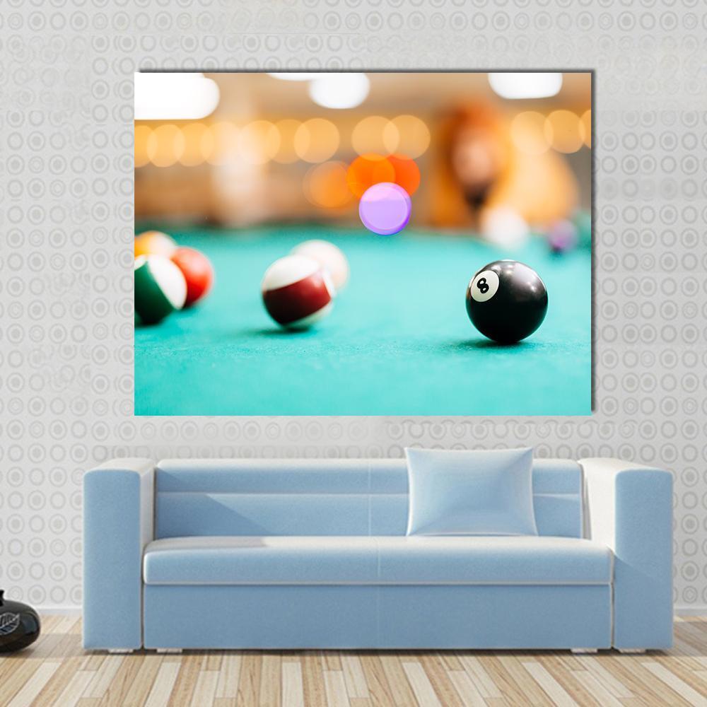 Snooker Eight Ball Pool Canvas Wall Art in black, orange and green, single panel hung on a wall