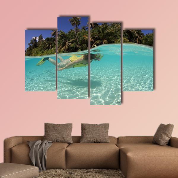 Snorkeler Diving In Blue Lagoon Canvas Wall Art-4 Pop-Gallery Wrap-50" x 32"-Tiaracle