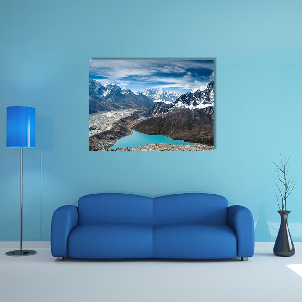 Snow-capped Peaks Over Turquoise Lake Nepal Canvas Wall Art in white, brown and blue, single panel hung on a wall