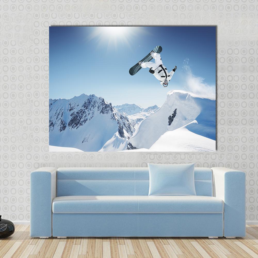 Snowboard Jump Canvas Wall Art in white and blue, 4 panel Pop layout hung on a wall
