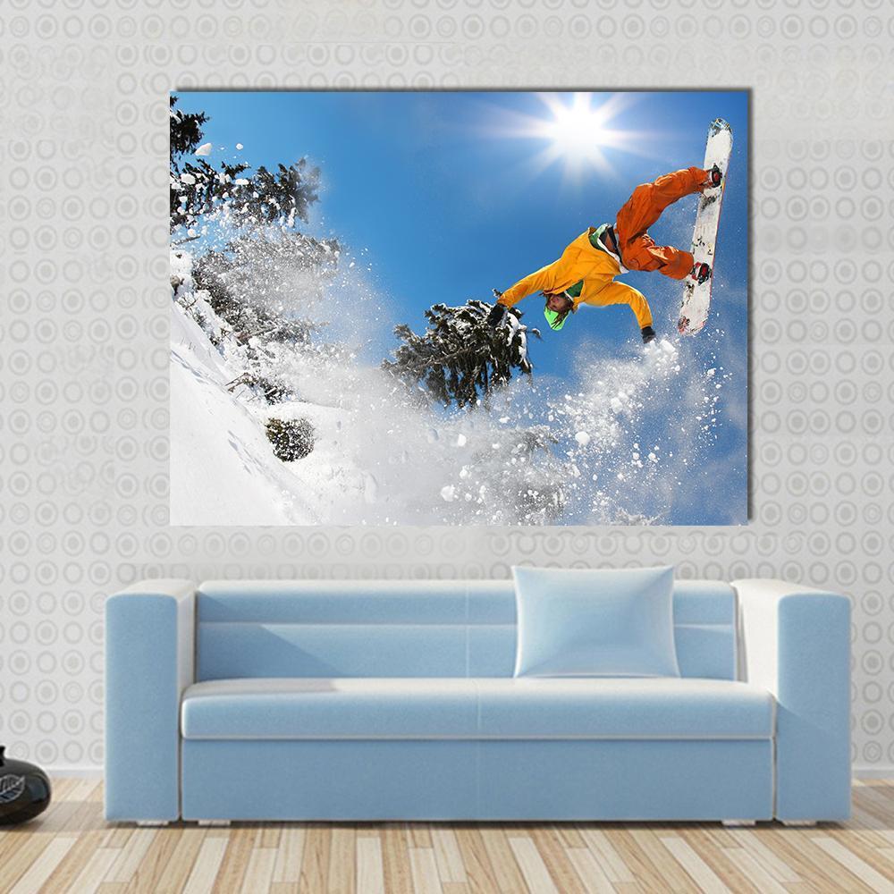 Snowboarder Jumping Against Blue Sky Canvas Wall Art-1 Piece-Gallery Wrap-36" x 24"-Tiaracle