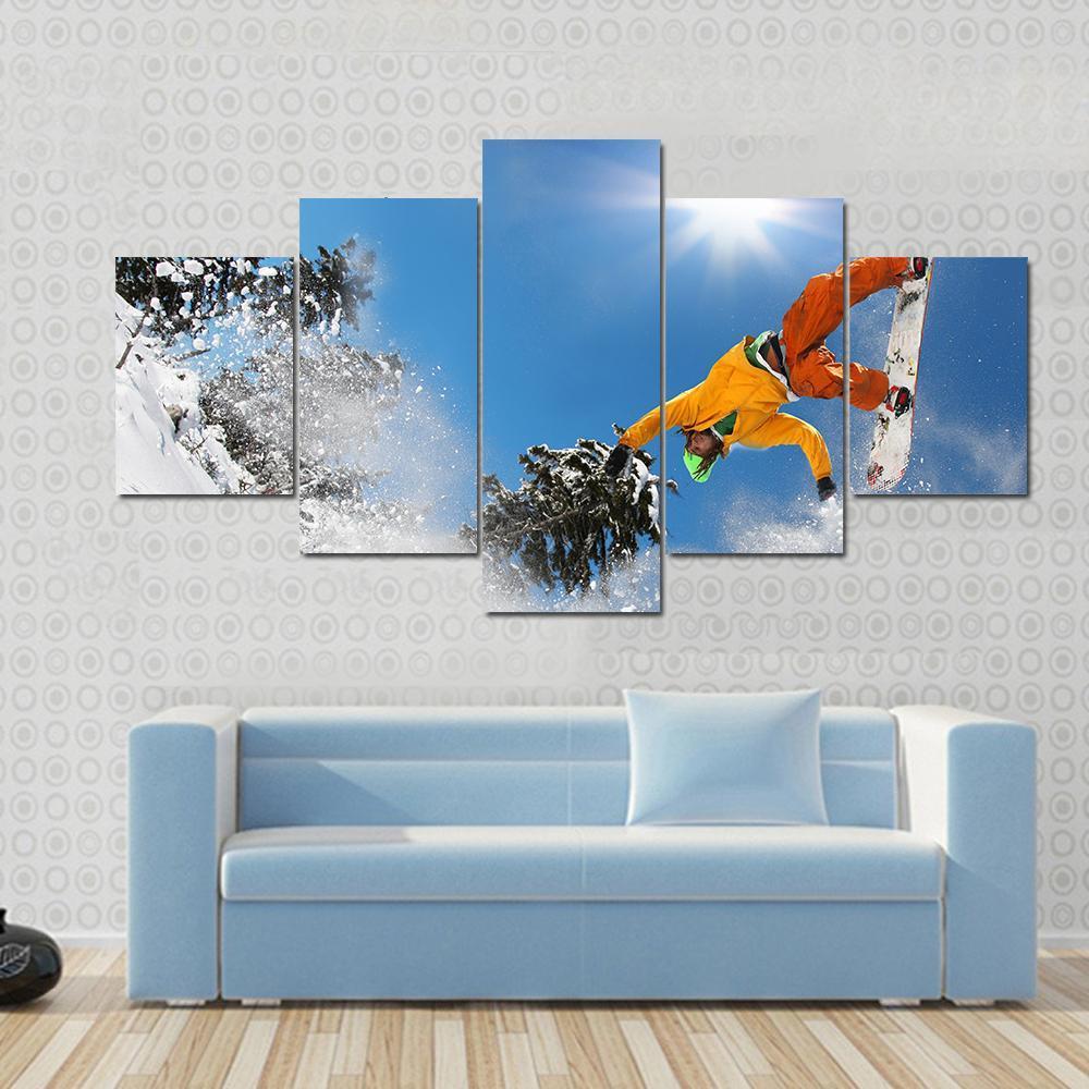 Snowboarder Jumping Against Blue Sky Canvas Wall Art-4 Pop-Gallery Wrap-50" x 32"-Tiaracle