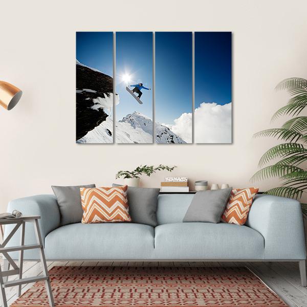 Snowboarder Jumping Through Air After Rock Drop Canvas Wall Art-4 Horizontal-Gallery Wrap-34" x 24"-Tiaracle
