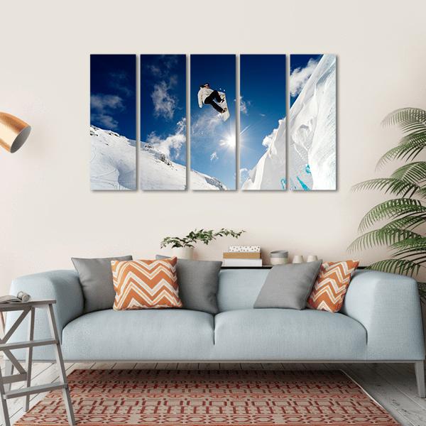 Snowboarder Jumping Through The Air With Blue Sky Canvas Wall Art-5 Horizontal-Gallery Wrap-22" x 12"-Tiaracle