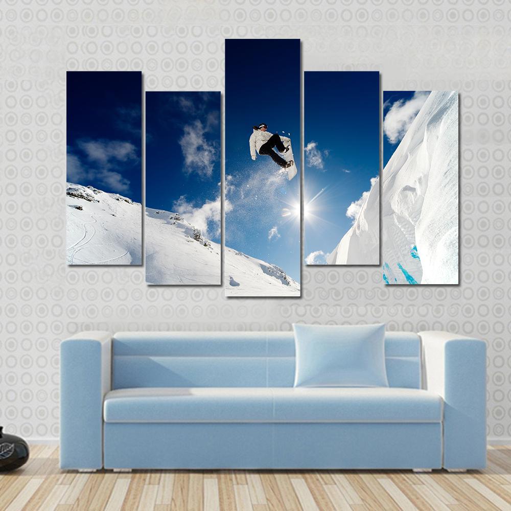 Snowboarder Jumping Through The Air With Blue Sky Canvas Wall Art-5 Pop-Gallery Wrap-47&quot; x 32&quot;-Tiaracle