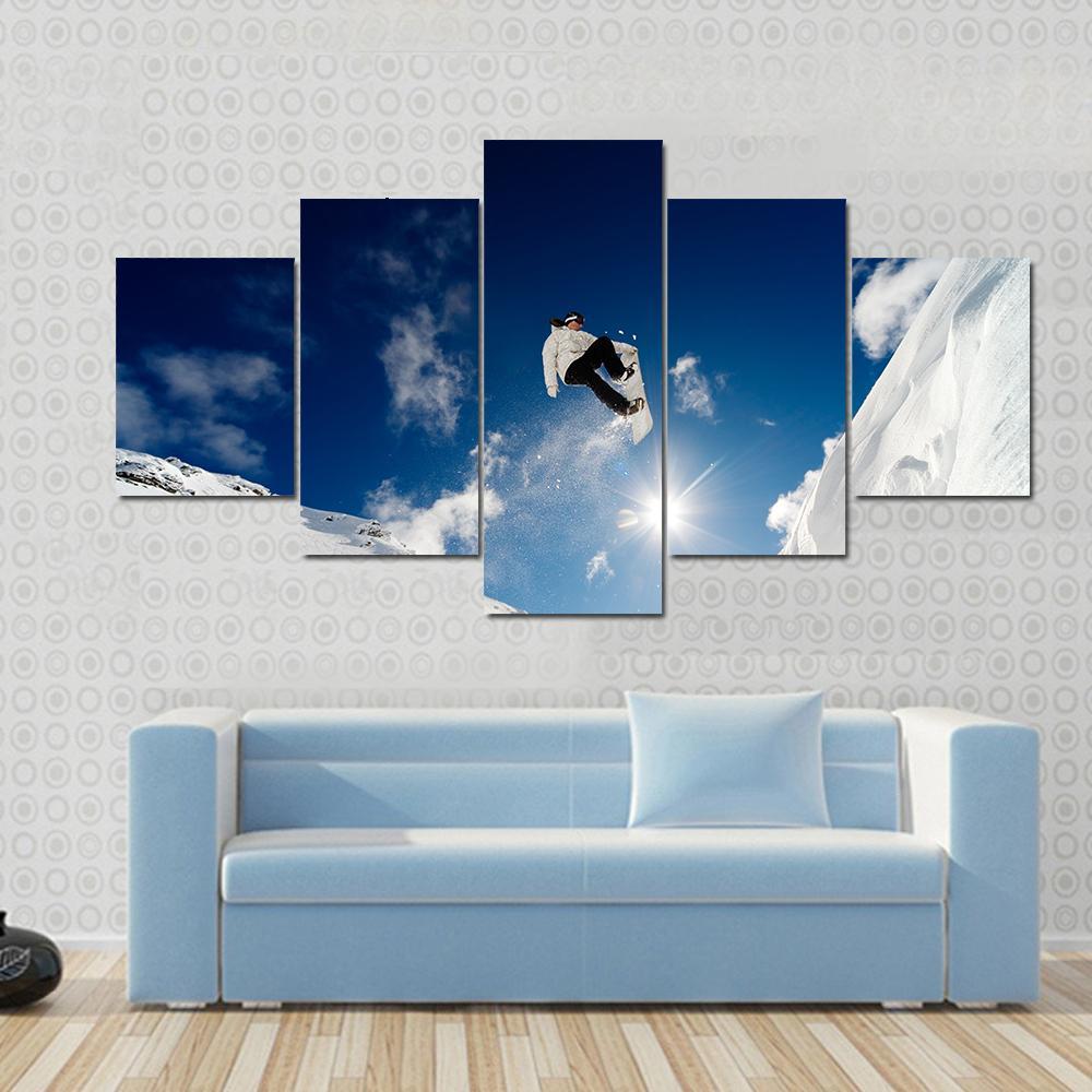 Snowboarder Jumping Through The Air With Blue Sky Canvas Wall Art-3 Horizontal-Gallery Wrap-37" x 24"-Tiaracle