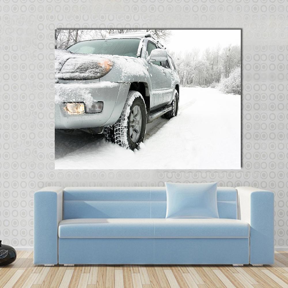 Snowy Winter Car and Road Canvas Wall Art in black, white and gray, single panel hung on a wall