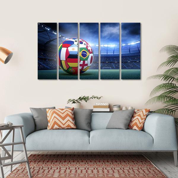 Soccer Ball with International Flags Canvas Wall Art in green, blue and multicolor, hung on a wall