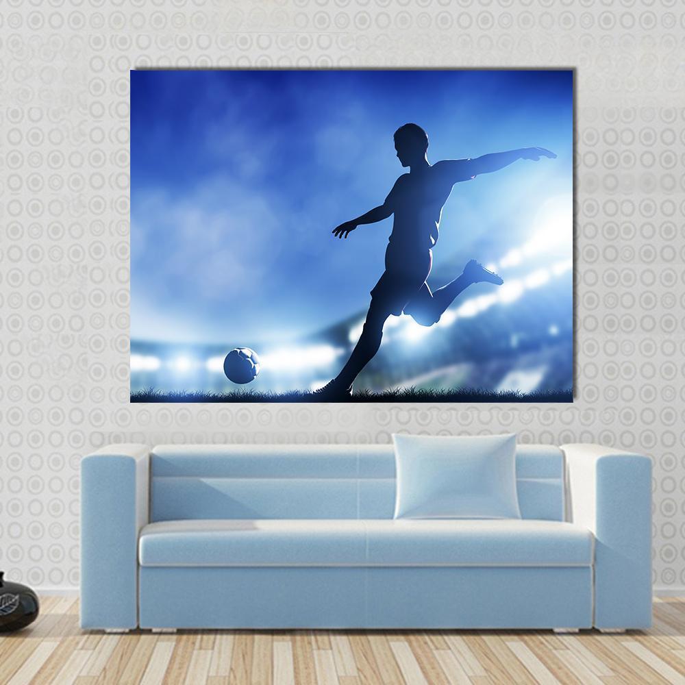 Soccer Match and Player Canvas Wall Art in black, white and blue, single panel hung on a wall