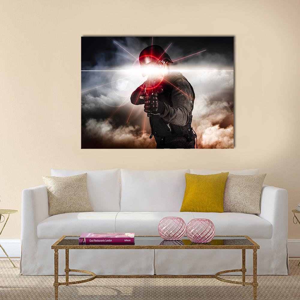 Soldier Aiming with Laser Sight Canvas Wall Art in black, gray and red, single panel hung on a wall
