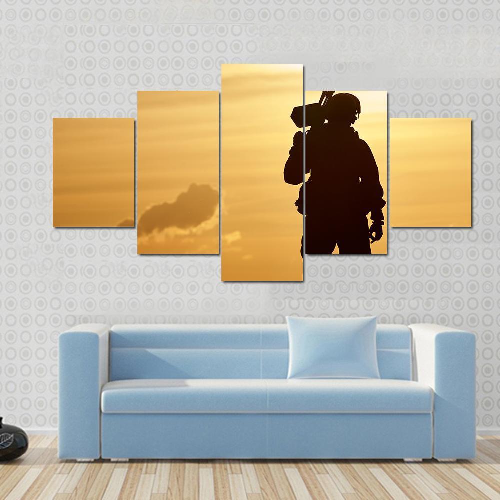 Soldier With Machine Gun At Sunset Canvas Wall Art-1 Piece-Gallery Wrap-48" x 32"-Tiaracle