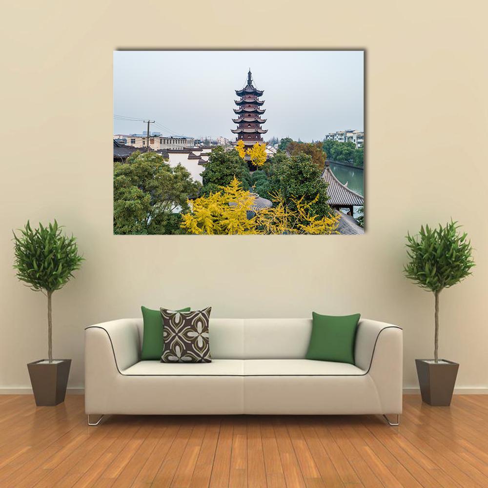 Songjiang Sijing Pagoda Over Canal, Shanghai Canvas Wall Art in white, gray and green, single panel hung on a wall