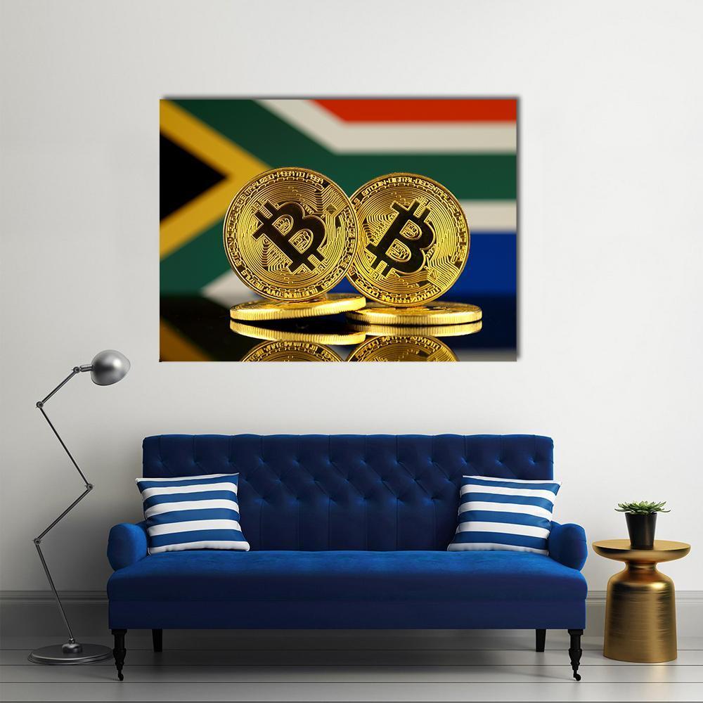 Stacked Bitcoin Coins with South African Flag Canvas Wall Art in gold, red and green, single panel hung on a wall