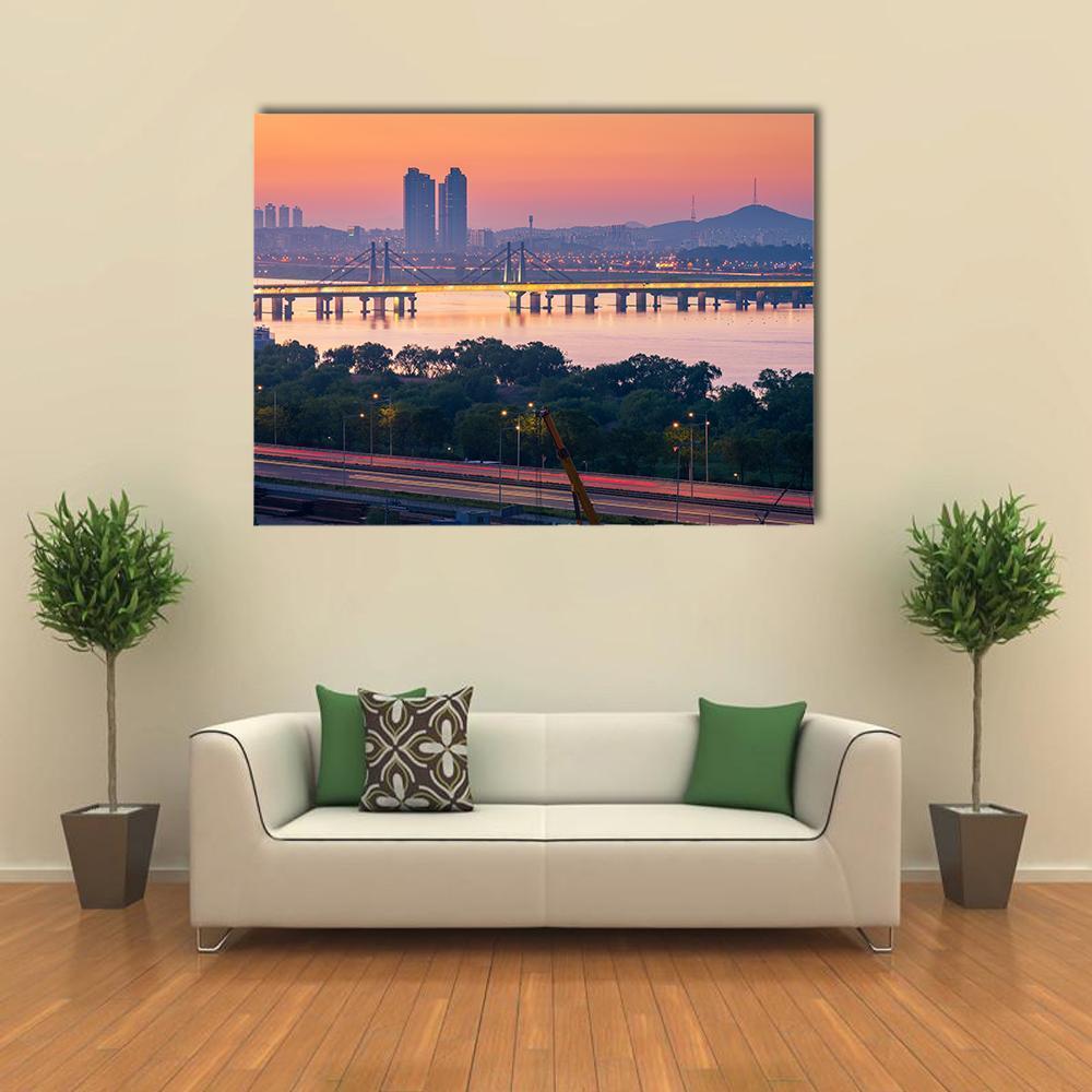 Seoul City Skyline at Twilight Canvas Wall Art in orange, blue and pink, single panel hung on a wall