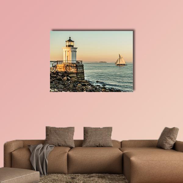 Bug Light Lighthouse at Sunset Canvas Wall Art in gray, yellow and blue, single panel hung on a wall