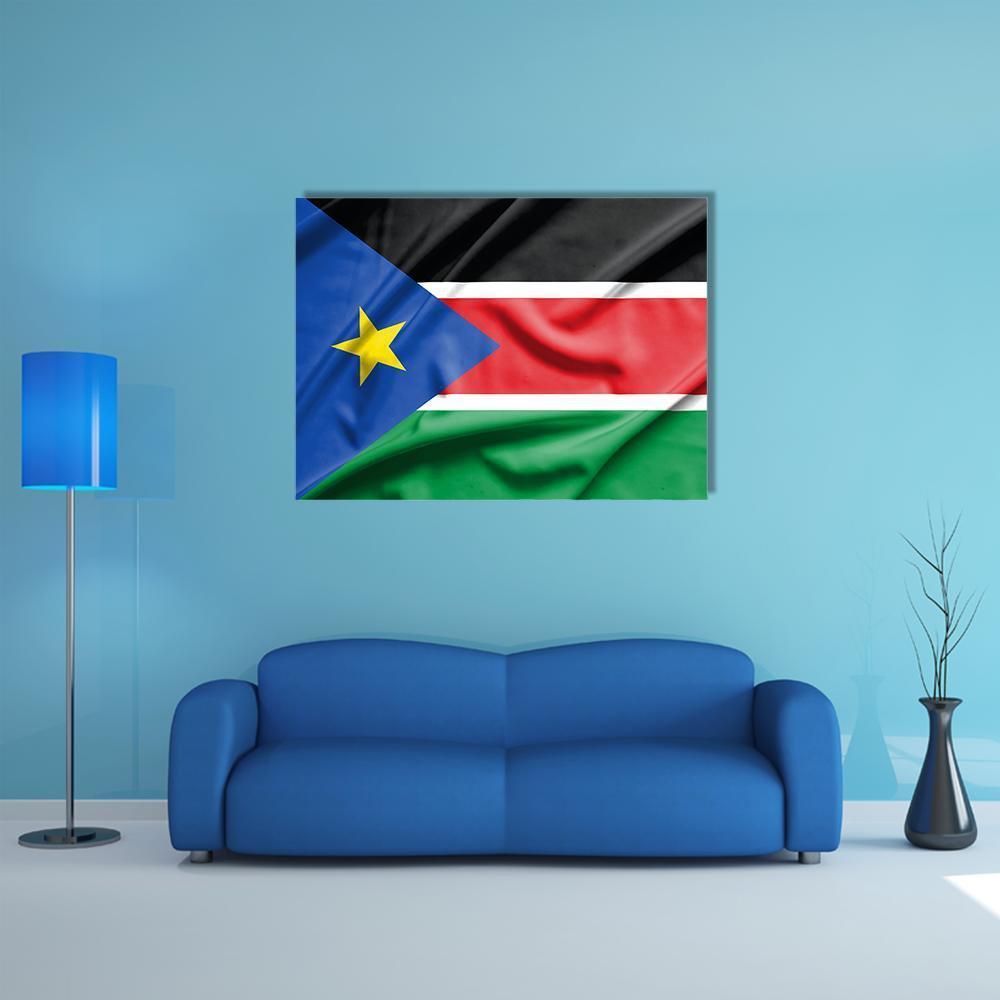 South Sudan Flag on Silk Texture Canvas Wall Art in red, blue and multicolor, single panel hung on a wall