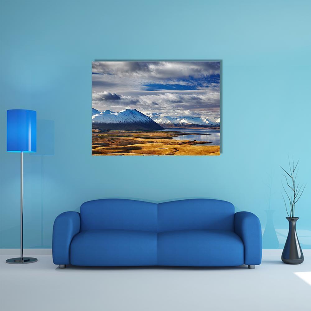 Southern Alps and Lake Tekapo Canvas Wall Art in white, yellow and blue, single panel hung on a wall