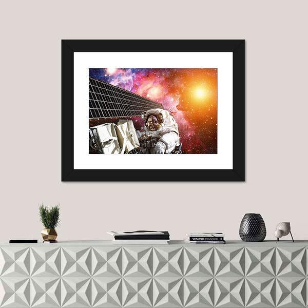 Space Station And Astronaut In Outer Space Over The Planet Earth Canvas Wall Art-1 Piece-Framed Print-20" x 16"-Tiaracle