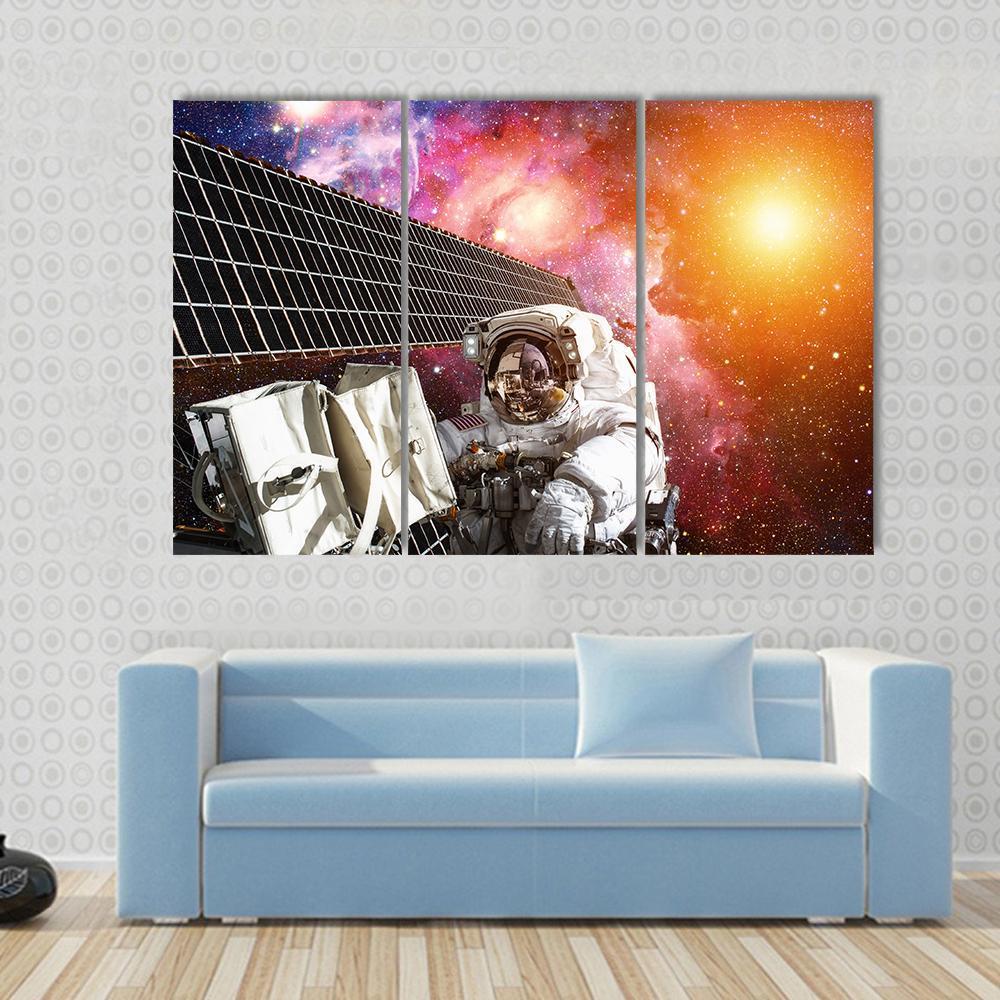 Space Station And Astronaut In Outer Space Over The Planet Earth Canvas Wall Art-3 Horizontal-Gallery Wrap-37" x 24"-Tiaracle