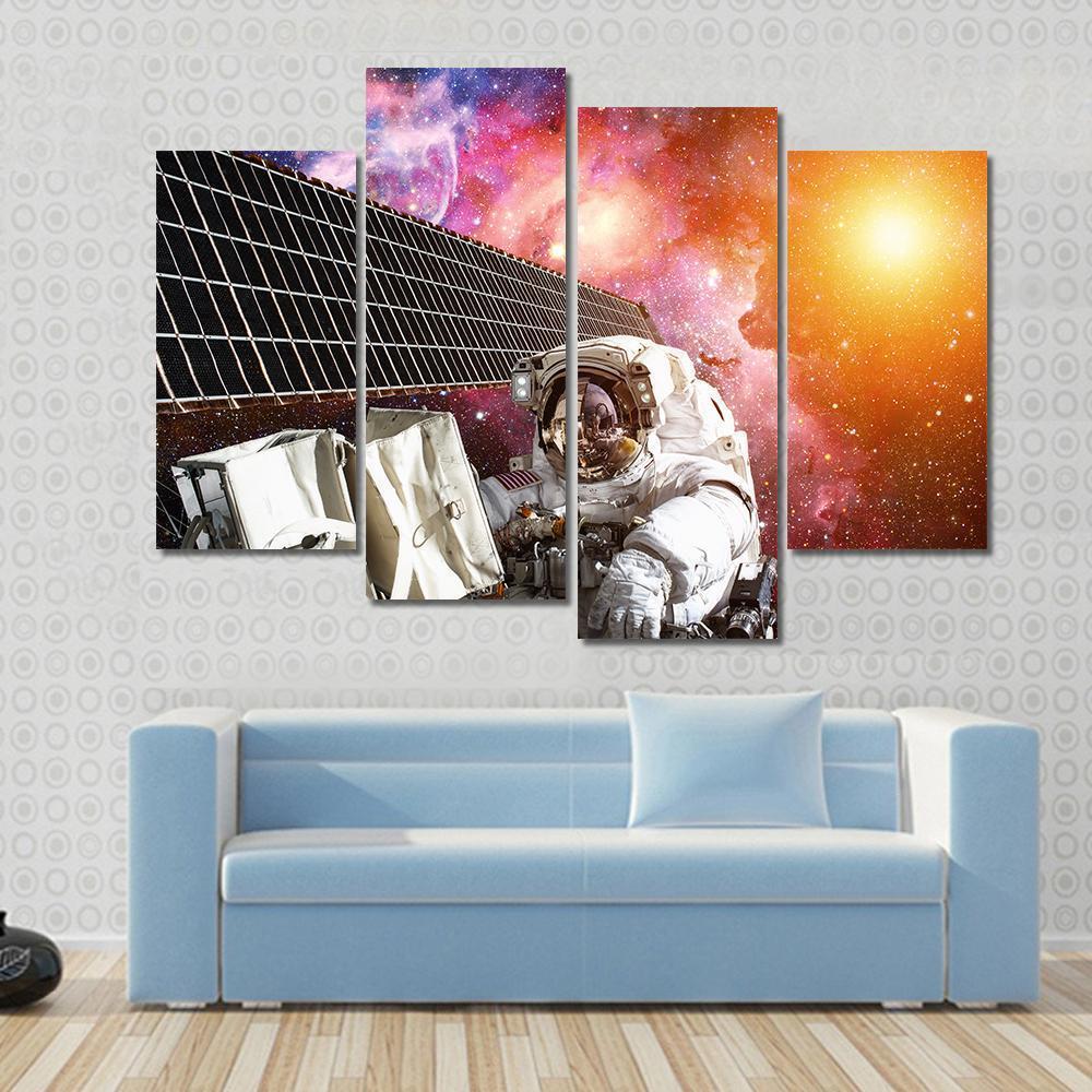 Space Station And Astronaut In Outer Space Over The Planet Earth Canvas Wall Art-4 Pop-Gallery Wrap-50" x 32"-Tiaracle