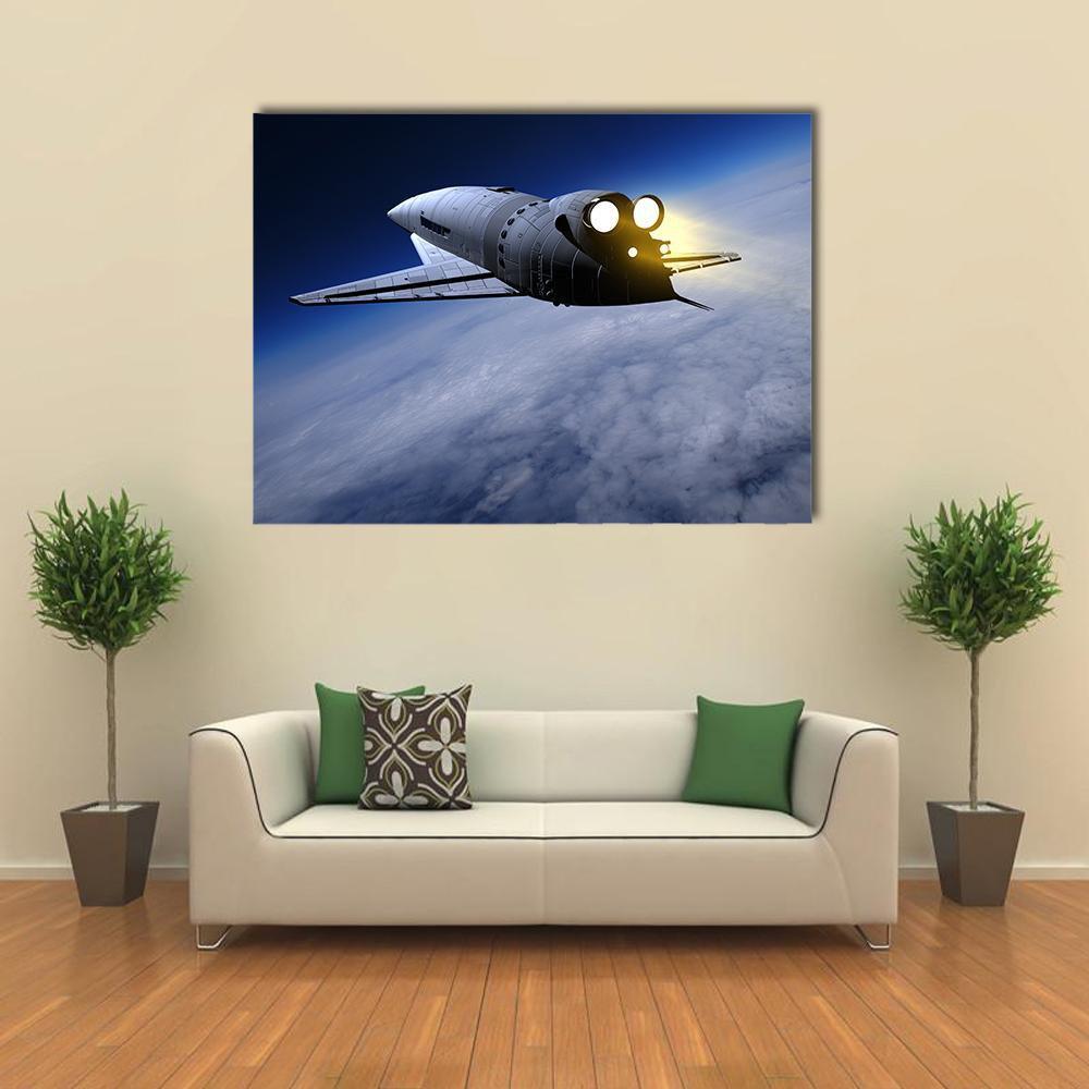 Space Shuttle Above Earth Canvas Wall Art in black, white and blue, single panel hung on a wall
