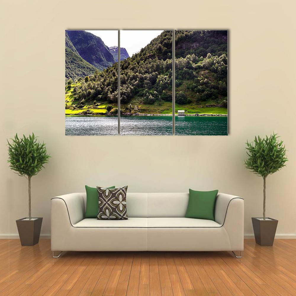 Norwegian Fjord with White House Canvas Wall Art in gray, green and blue, 3 panel horizontal set hung on a wall